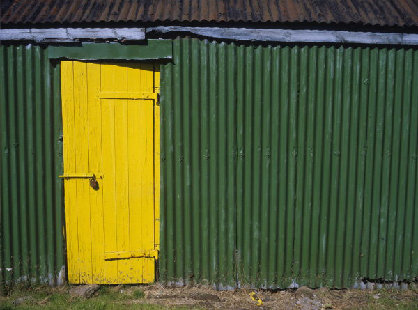 Painted yellow door on the Island of Rhum, Western Isles. 