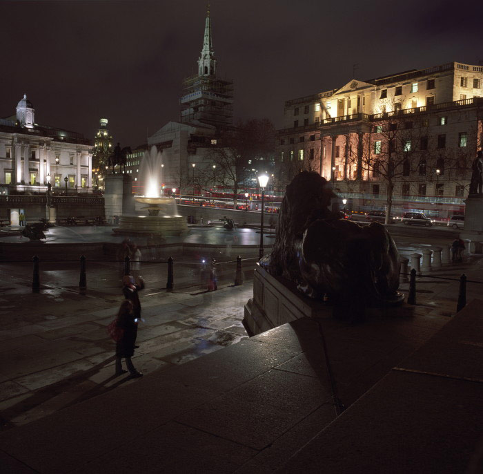 Trafalgar Square at night.