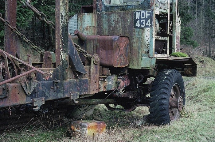 An ex-military vehicle converted into a forestry crane.