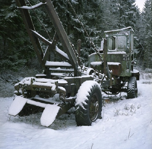 The same forestry truck, only now in snow.